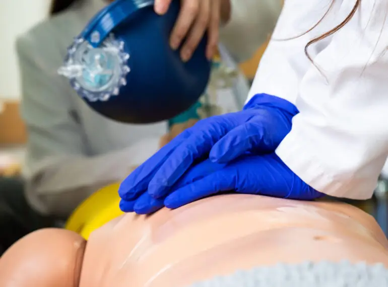 students practicing cpr for emergency situations